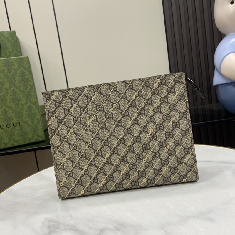 G*u*i clutch bags